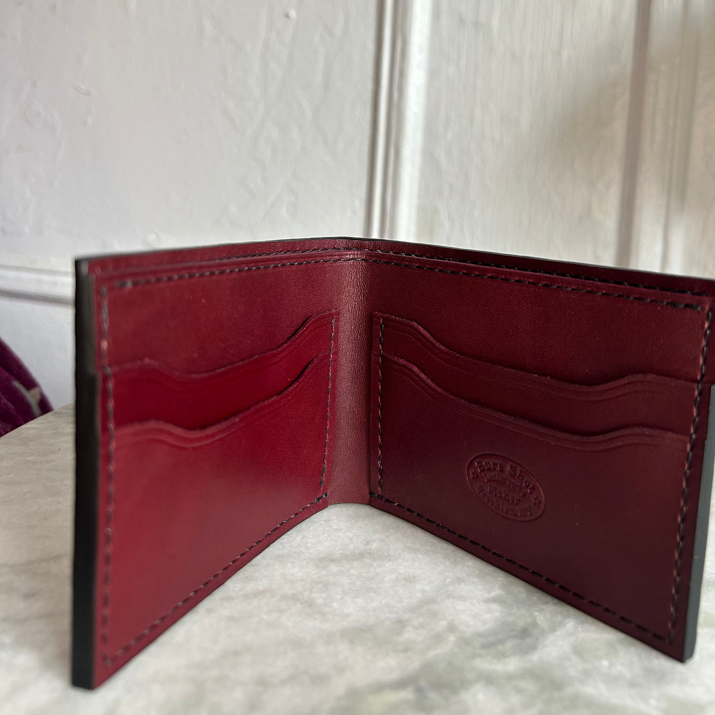 Bifold Embossed Ostrich Wallet